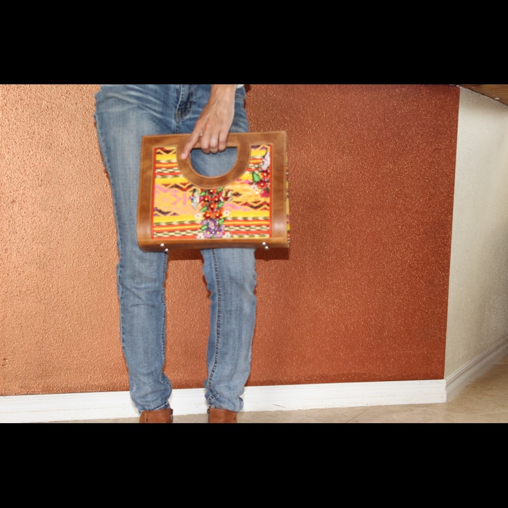 Embroidered leather handle purse